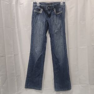 Classic Blue Boot Cut Jeans with Distressed Details